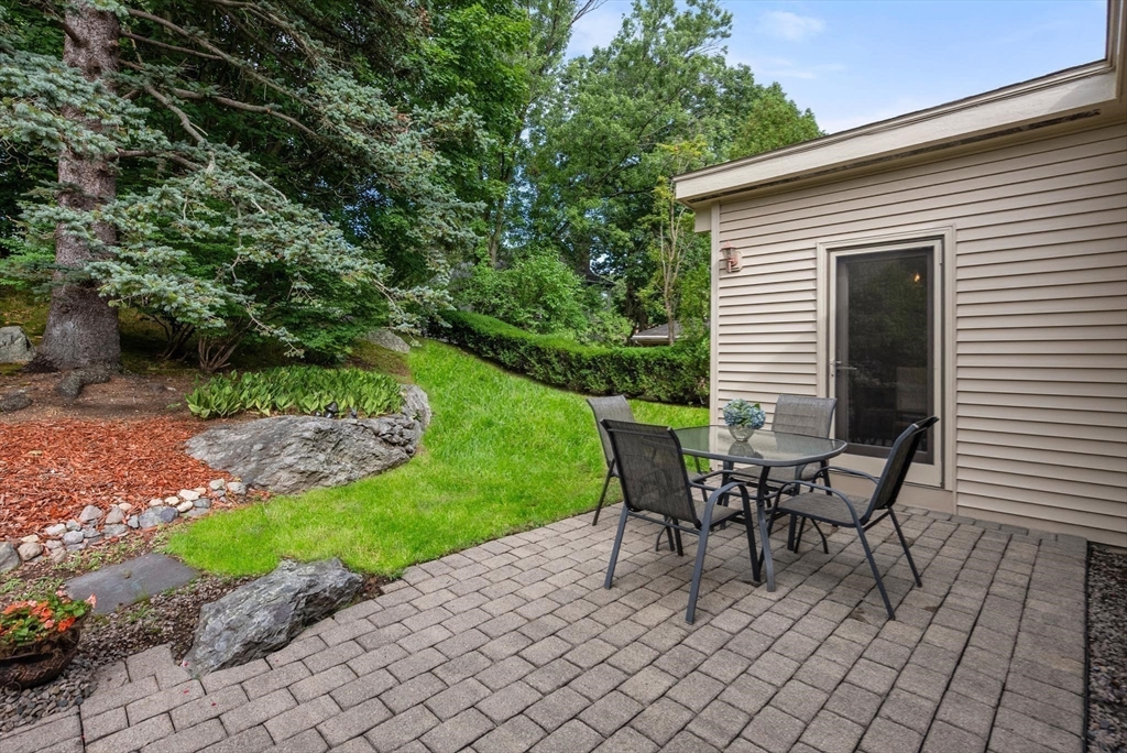 54 Clark Street Newton, MA 02459 - Photo 32 of 34 a view of a house with backyard and sitting area