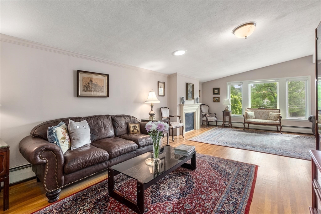 54 Clark Street Newton, MA 02459 - Photo 5 of 34 a living room with furniture and a large window