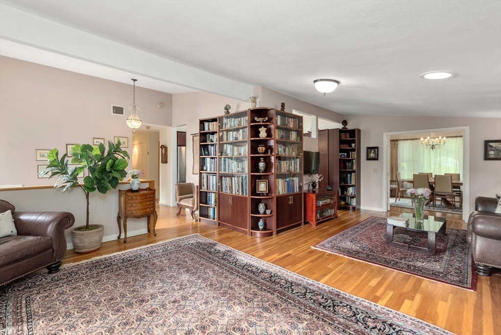 54 Clark Street Newton, MA 02459 - Photo 6 of 34 a living room with furniture and a book shelf