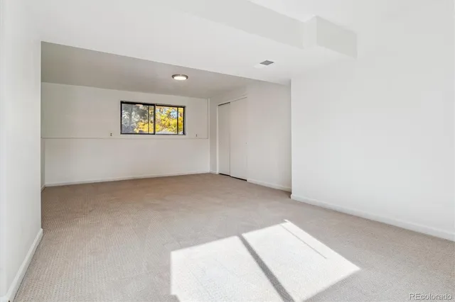 a view of an empty room with window