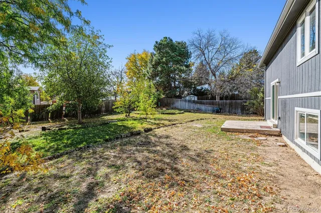a view of a swimming pool with an outdoor space and seating area