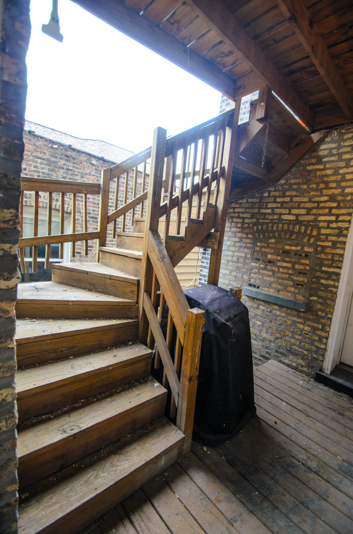 1122 North Oakley Boulevard, Unit C Chicago, IL 60622 - Photo 22 of 23 a view of entryway with a front door
