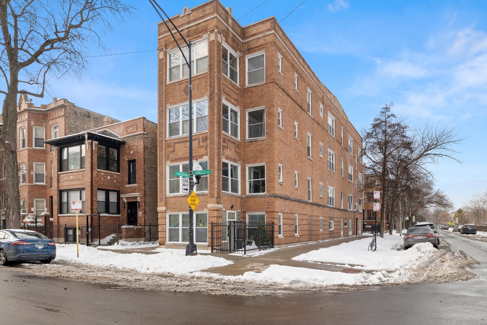 1122 North Oakley Boulevard, Unit C Chicago, IL 60622 - Photo 23 of 23 a view of a building with a street