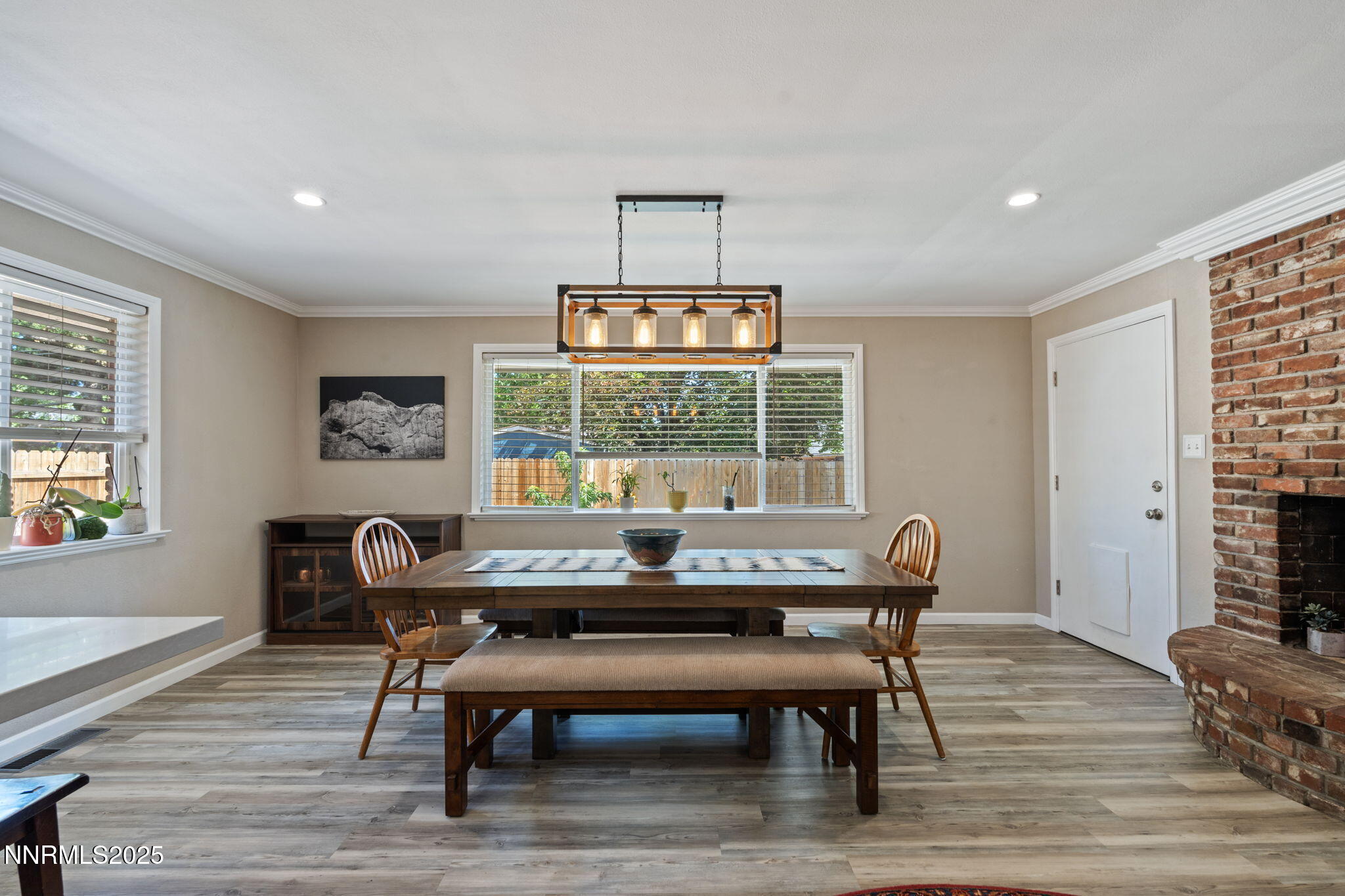 1445 California Avenue Reno, NV 89509 - Photo 14 of 29 a dining room with furniture a rug and wooden floor