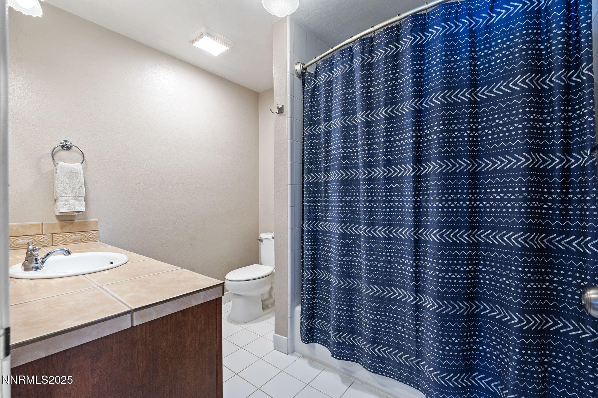 1445 California Avenue Reno, NV 89509 - Photo 22 of 29 a bathroom with a sink and a toilet