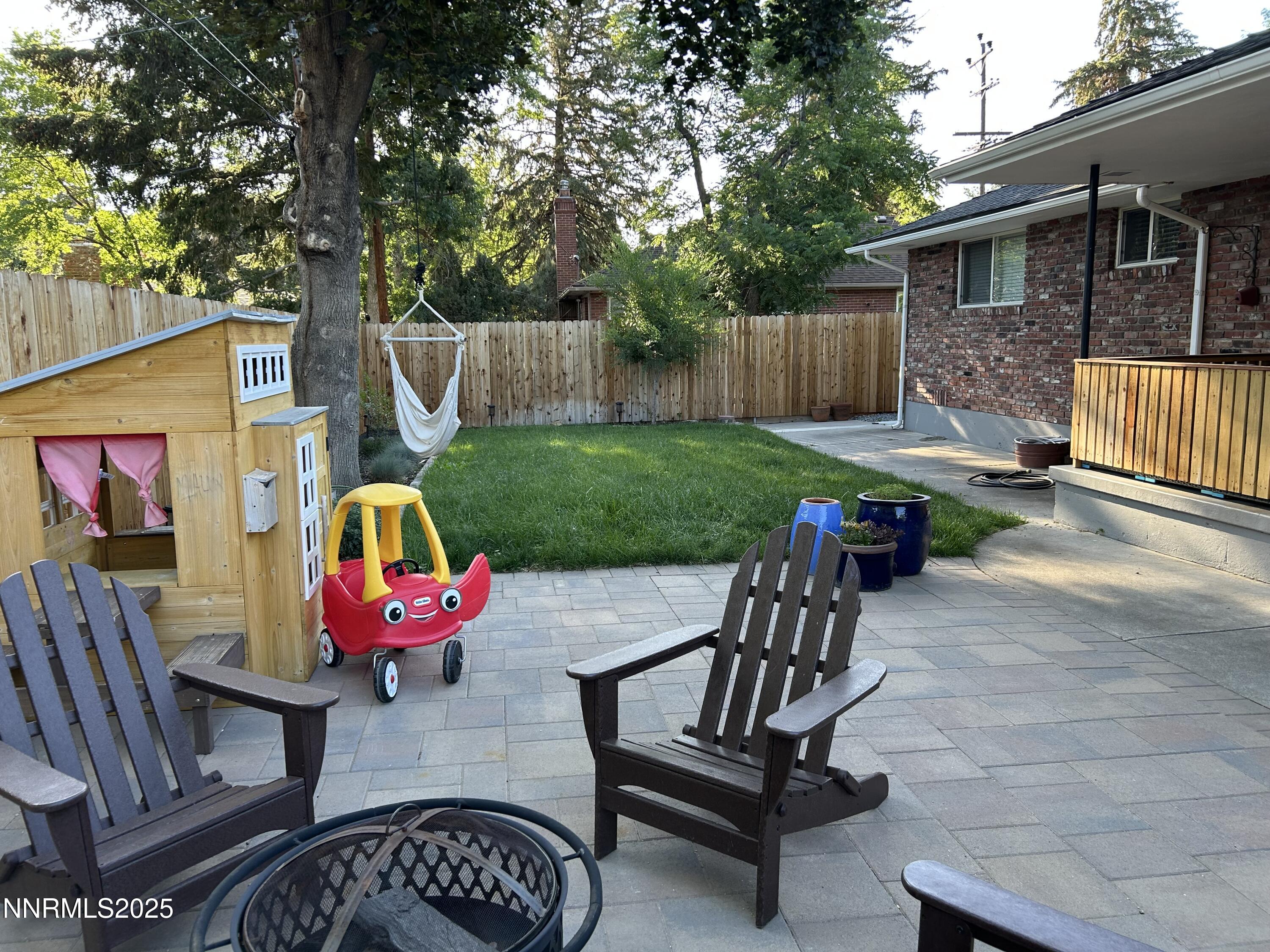 1445 California Avenue Reno, NV 89509 - Photo 24 of 29 a view of backyard with deck and seating space