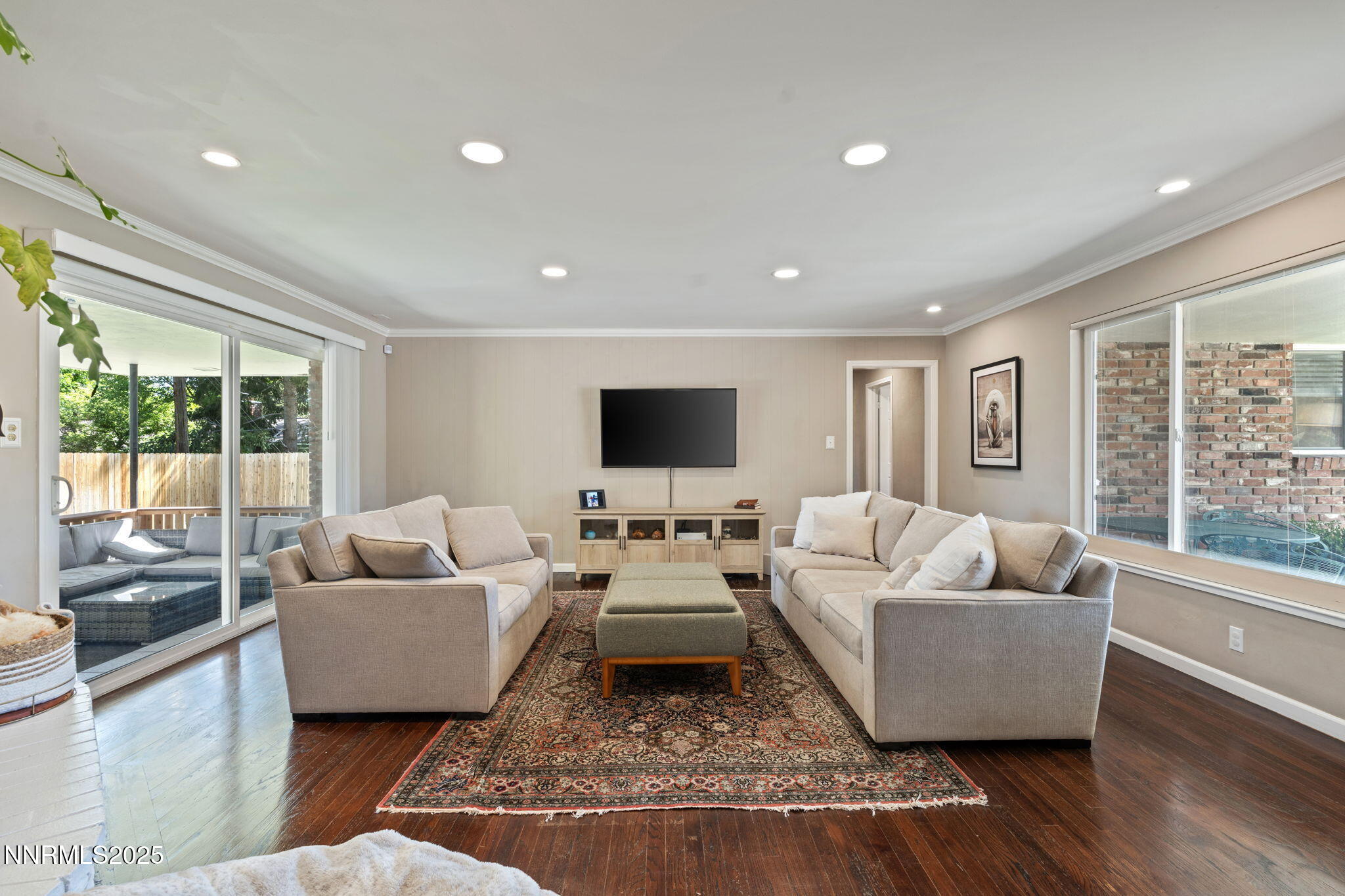 1445 California Avenue Reno, NV 89509 - Photo 7 of 29 a living room with furniture and a flat screen tv