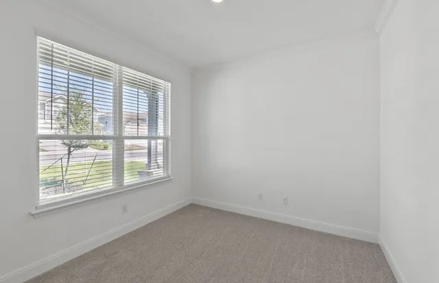 a view of a hallway with a wooden floor