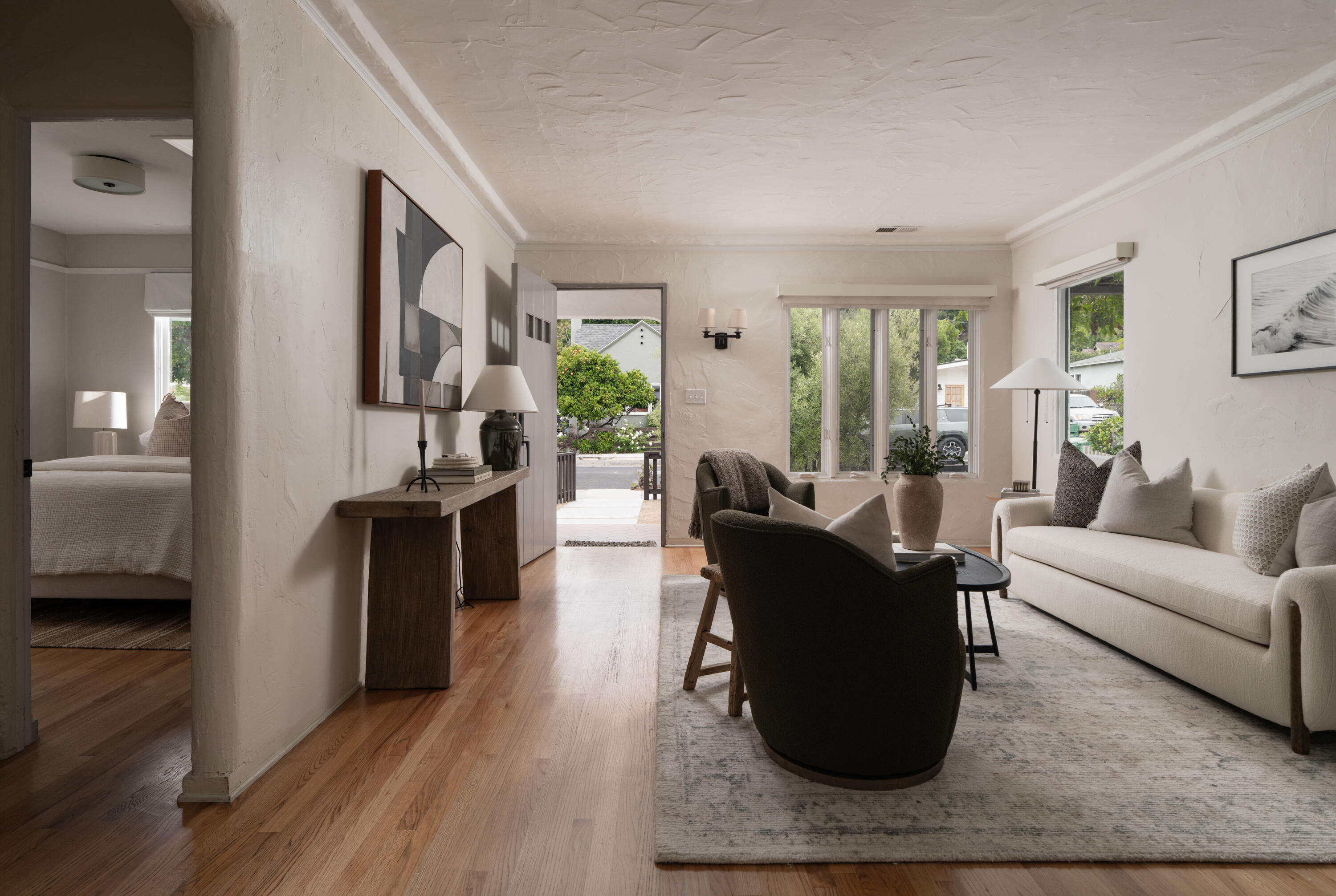 1740 Clearview Road Santa Barbara, CA 93101 - Photo 3 of 21 a living room with furniture large window and wooden floor