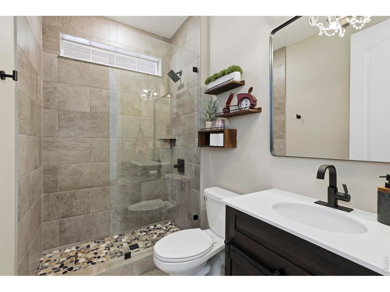 2910 Water View Street Timnath, CO 80547 - Photo 18 of 50 a bathroom with a sink toilet and shower