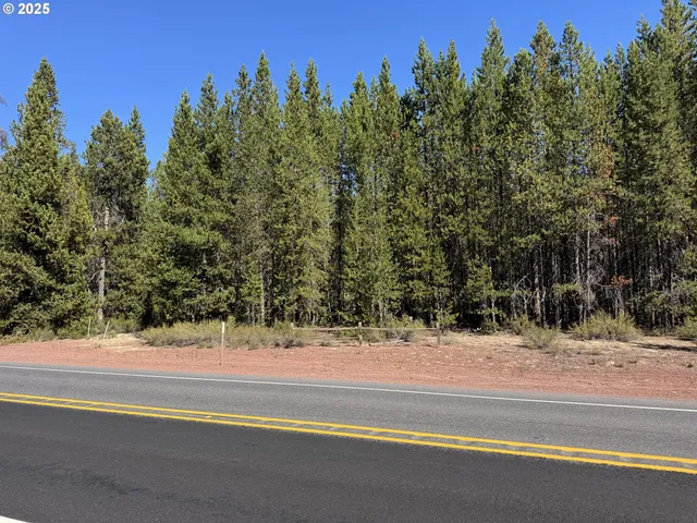 a view of a house with a street