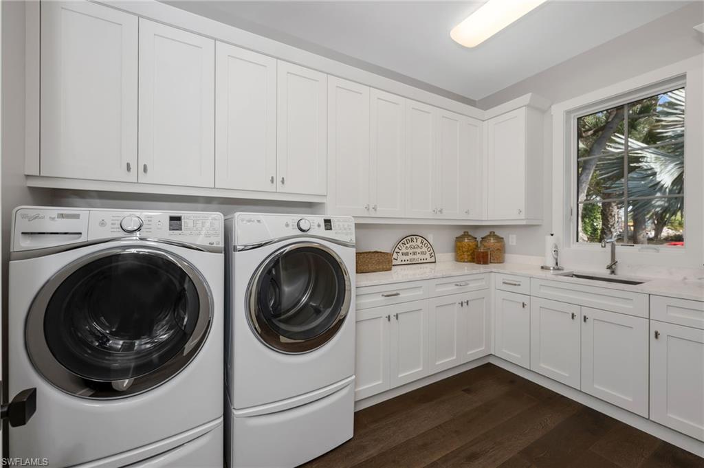 2025 Crayton Road Naples, FL 34102 - Photo 32 of 36 a utility room with sink dryer and washer