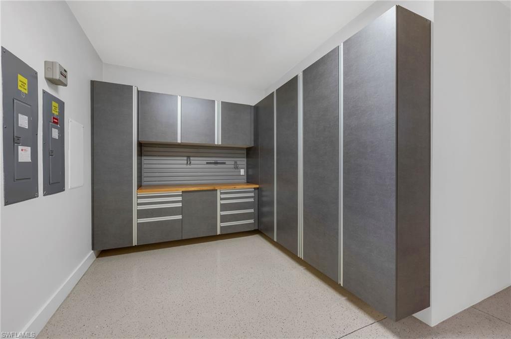 2025 Crayton Road Naples, FL 34102 - Photo 34 of 36 a view of walk in closet with cabinet