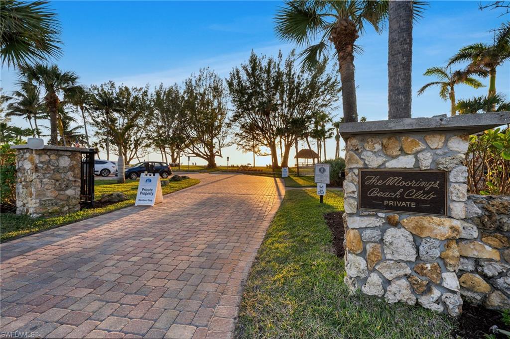 2025 Crayton Road Naples, FL 34102 - Photo 35 of 36 a view of swimming pool with a yard