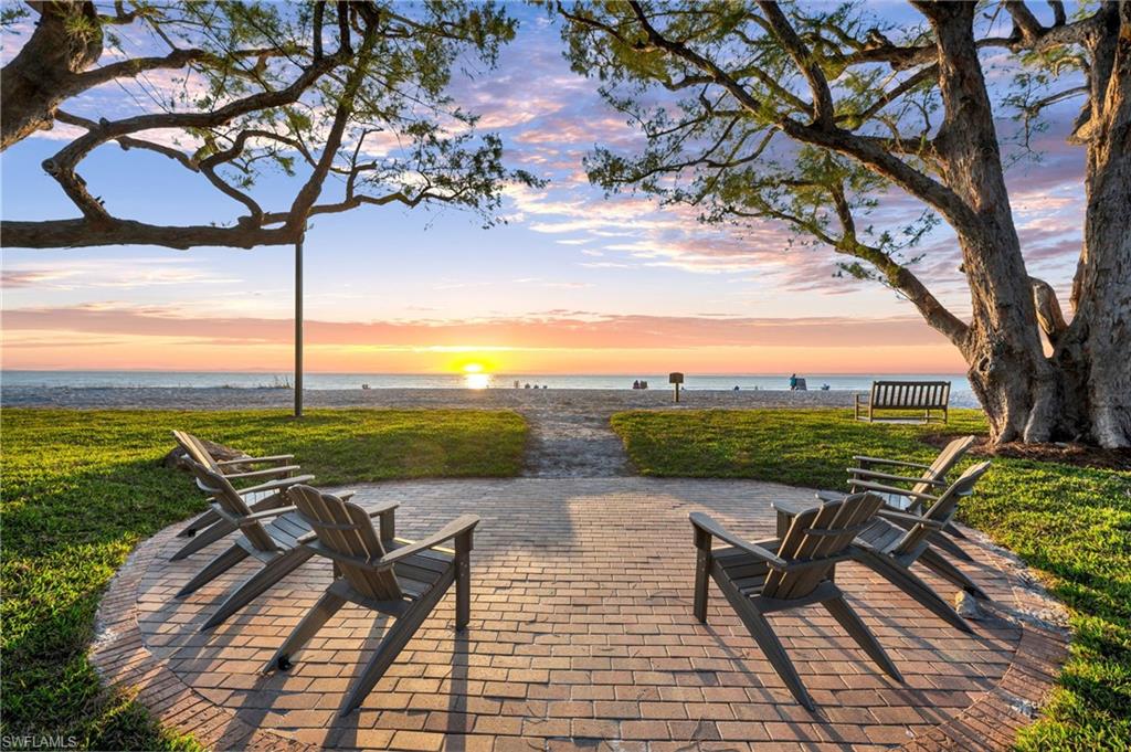 2025 Crayton Road Naples, FL 34102 - Photo 36 of 36 a view of a swimming pool with lounge chair