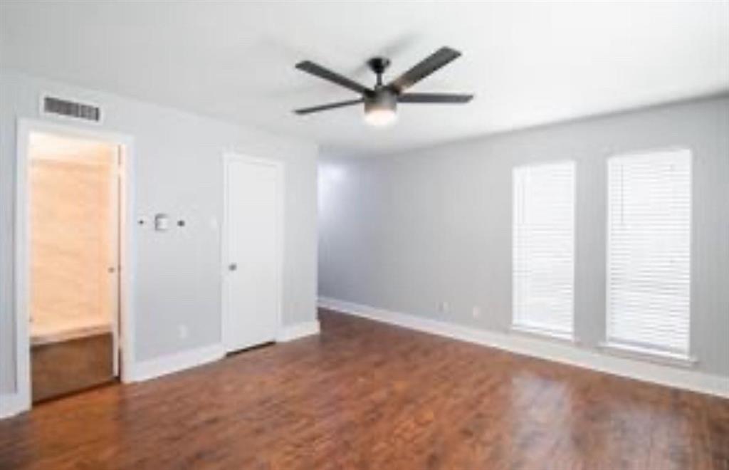 5808 Sandhurst Lane, Unit A Dallas, TX 75206 - Photo 5 of 9 a view of an empty room with a window