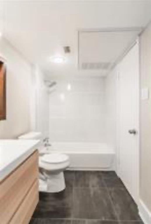 5808 Sandhurst Lane, Unit A Dallas, TX 75206 - Photo 7 of 9 a bathroom with a sink a toilet and a bathtub