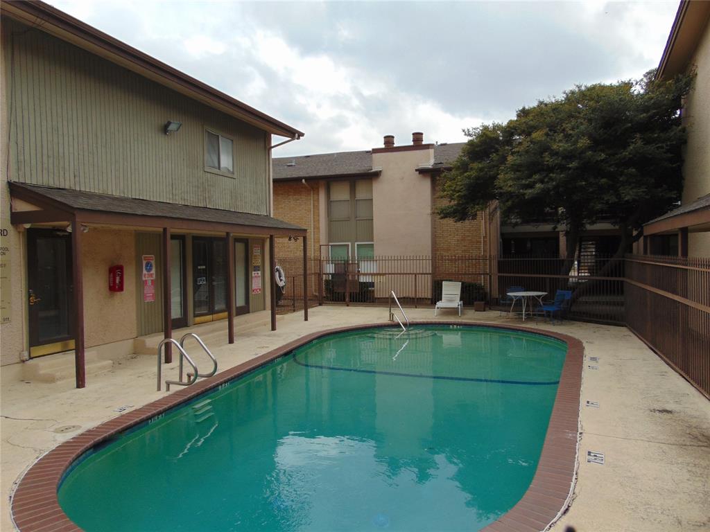 12806 Midway Road, Unit 2020 Dallas, TX 75244 - Photo 18 of 18 a view of a house with backyard
