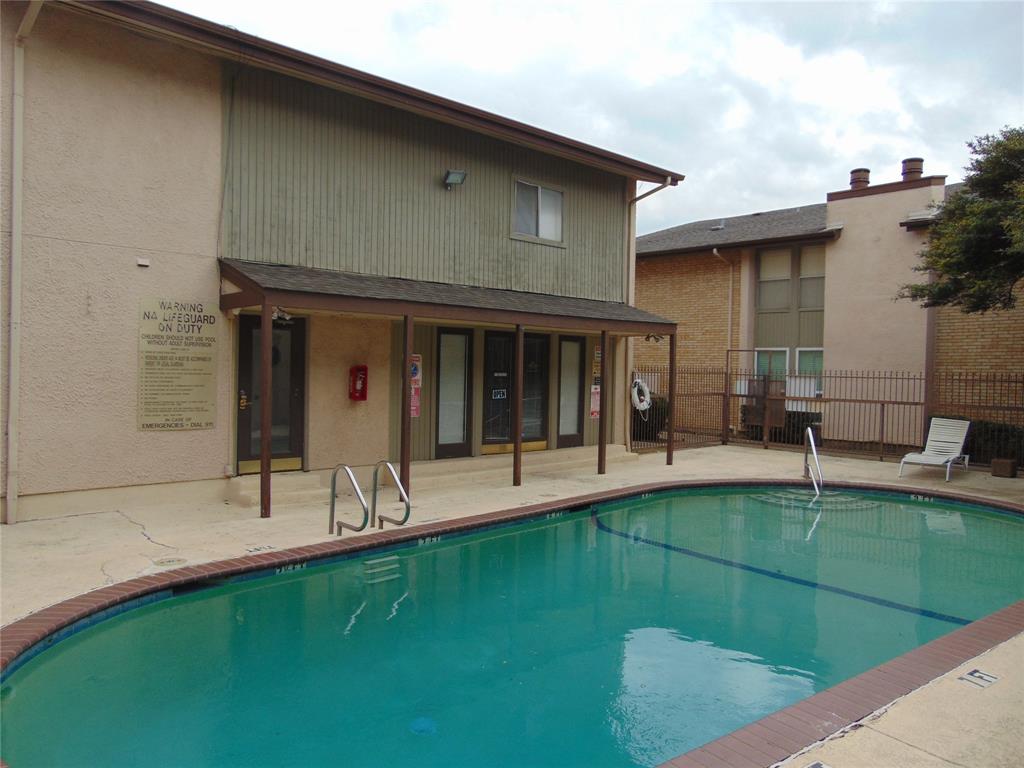 12806 Midway Road, Unit 2020 Dallas, TX 75244 - Photo 6 of 18 a view of an house with backyard space and porch