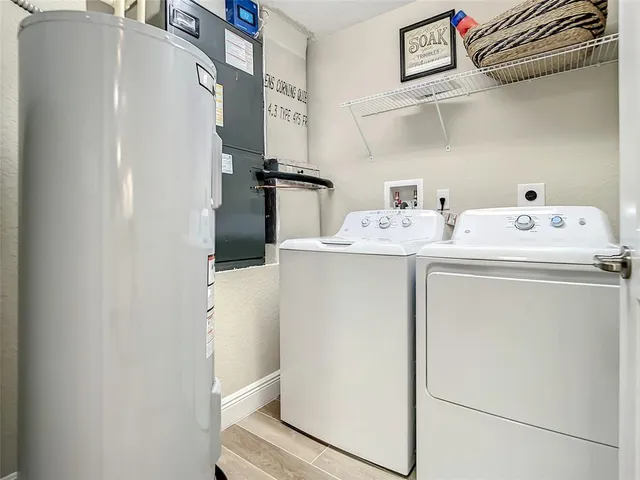 a utility room with dryer and washer