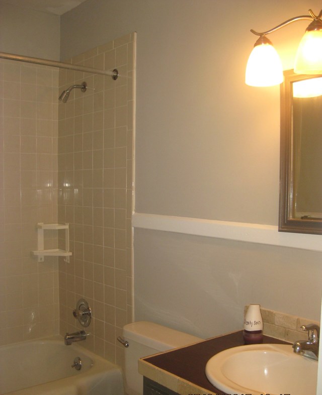 3220 Primrose Road Columbus, GA 31907 - Photo 13 of 16 a bathroom with a sink a toilet and shower