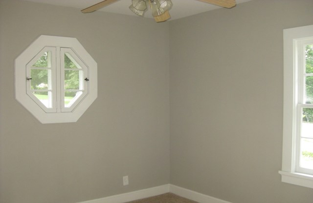 3220 Primrose Road Columbus, GA 31907 - Photo 7 of 16 an empty room with windows and entrance
