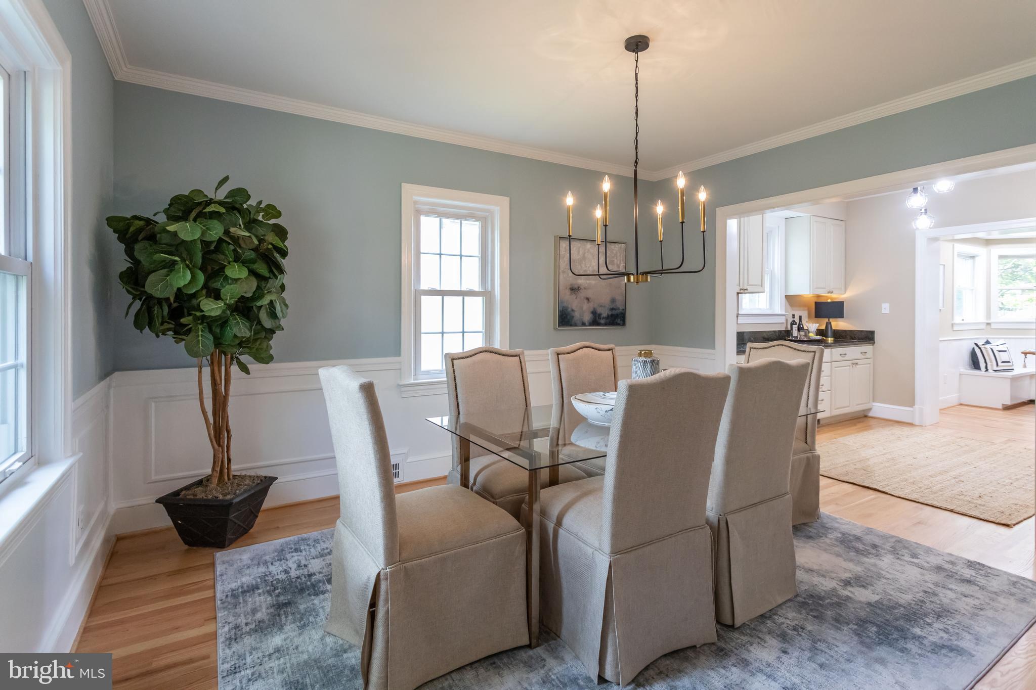 3832 North Dittmar Road Arlington, VA 22207 - Photo 6 of 40 Formal dining room with wainscotting