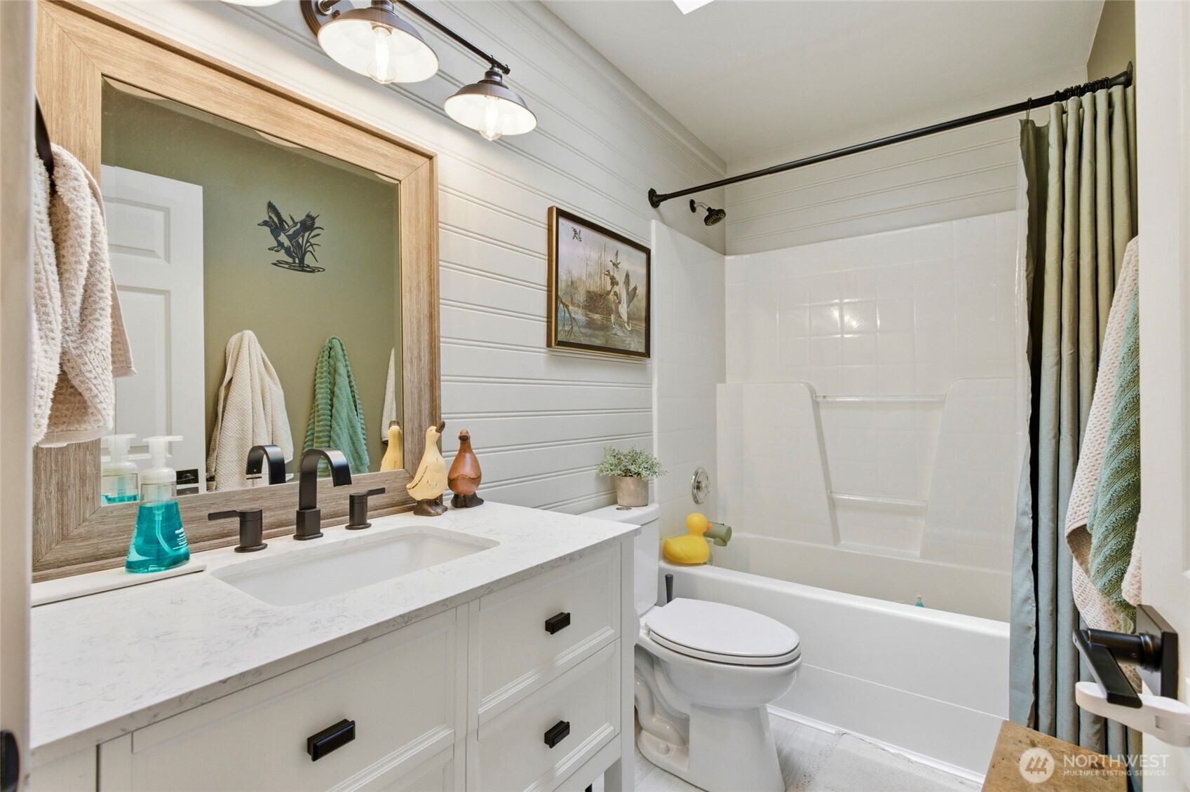 14005 Cedar Court Sultan, WA 98294 - Photo 16 of 38 a bathroom with a sink a toilet and a bathtub