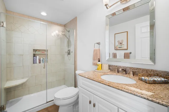 a bedroom with a bed and furniture