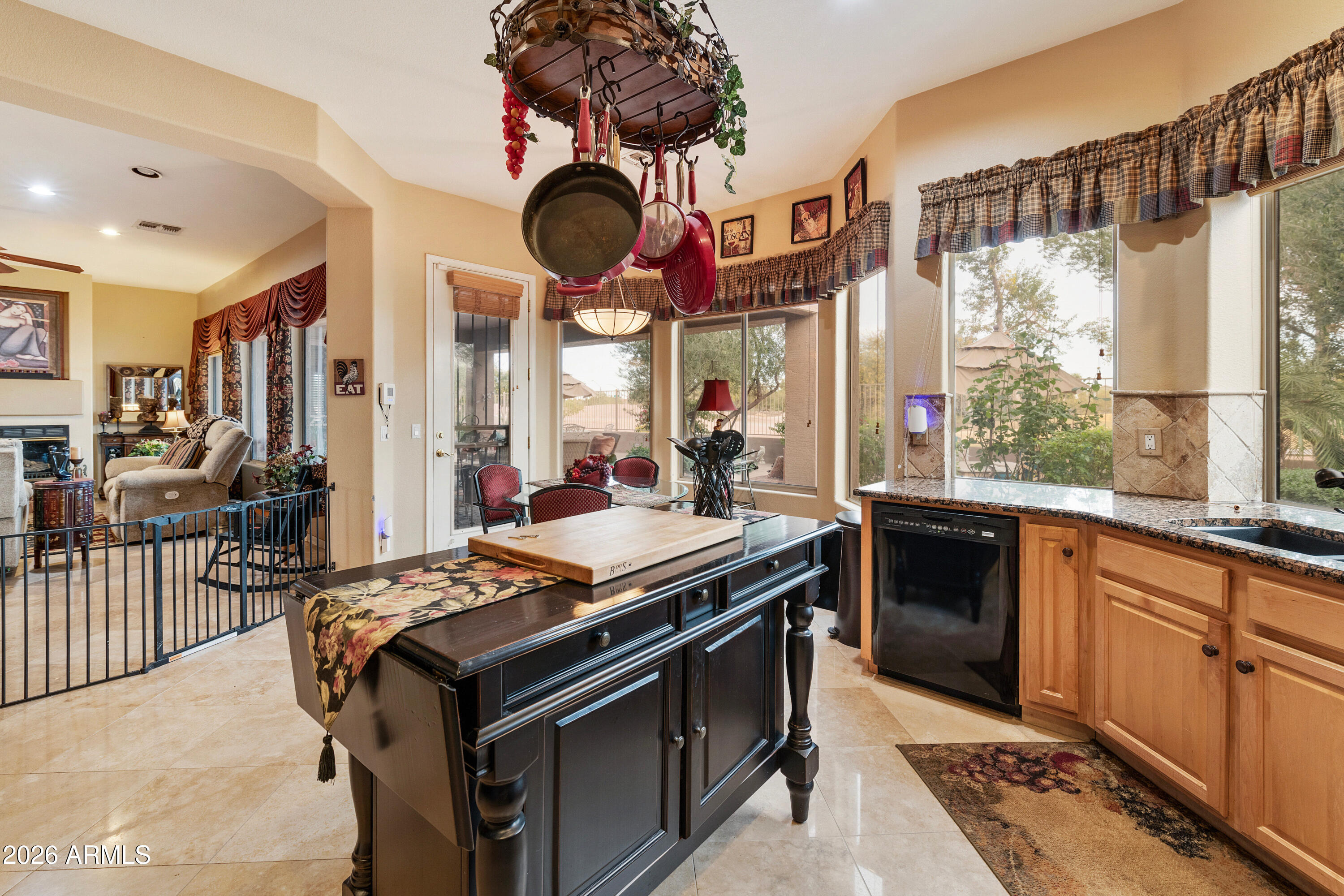 4100 East Strawberry Drive Gilbert, AZ 85298 - Photo 13 of 62 a kitchen with a stove and a sink