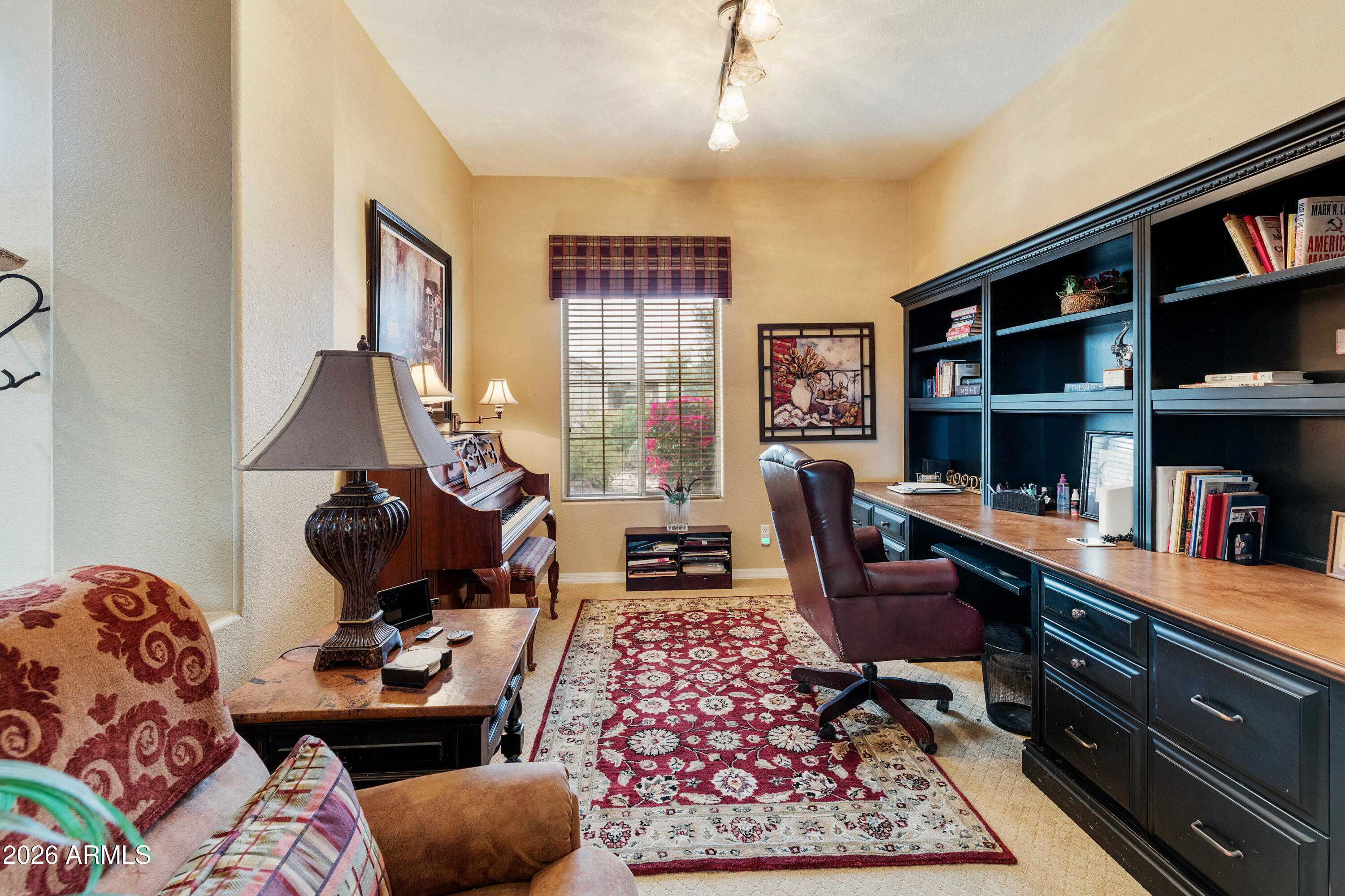 4100 East Strawberry Drive Gilbert, AZ 85298 - Photo 14 of 62 a workspace with furniture