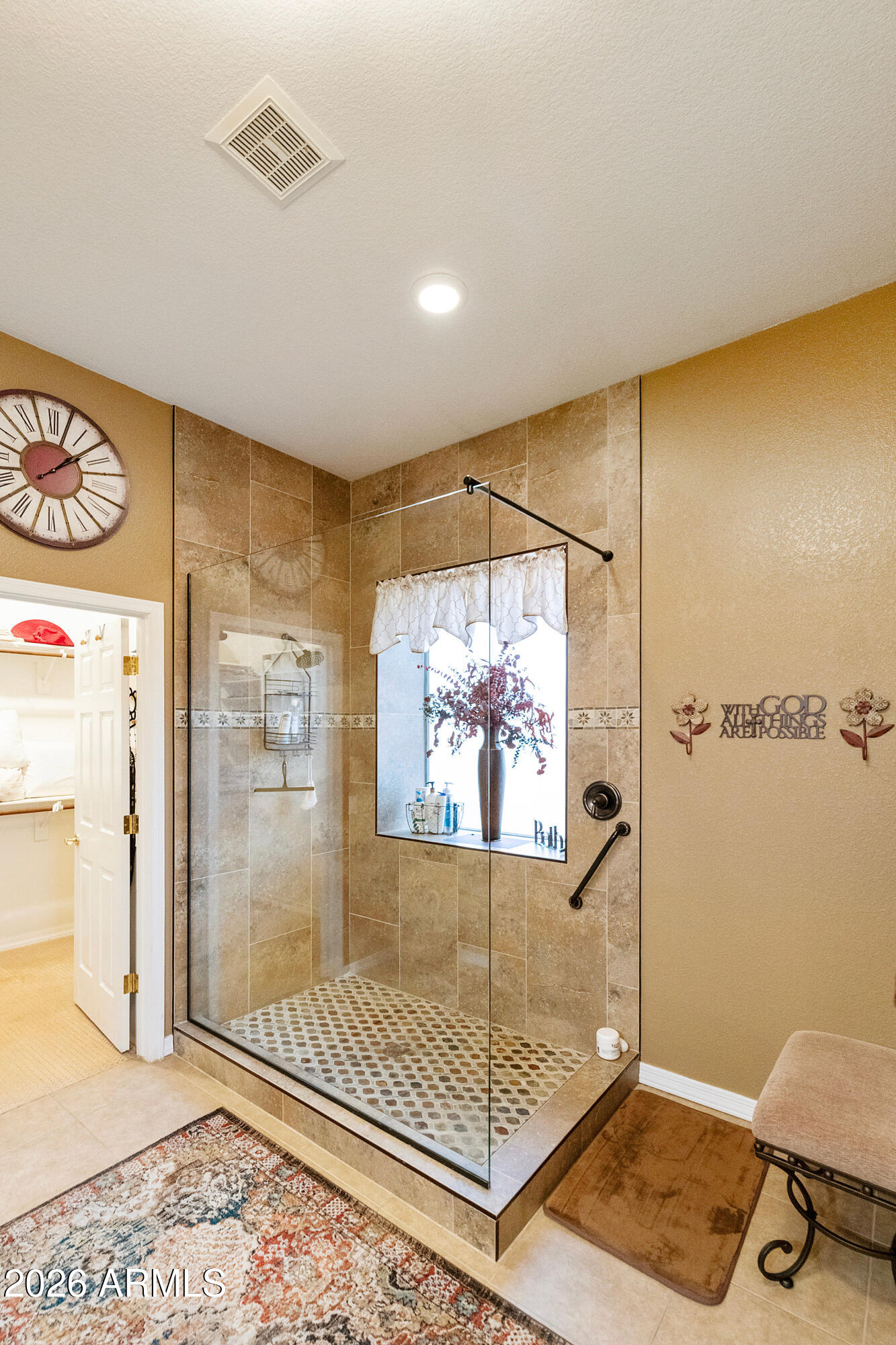 4100 East Strawberry Drive Gilbert, AZ 85298 - Photo 29 of 62 a view of a bathroom with a shower