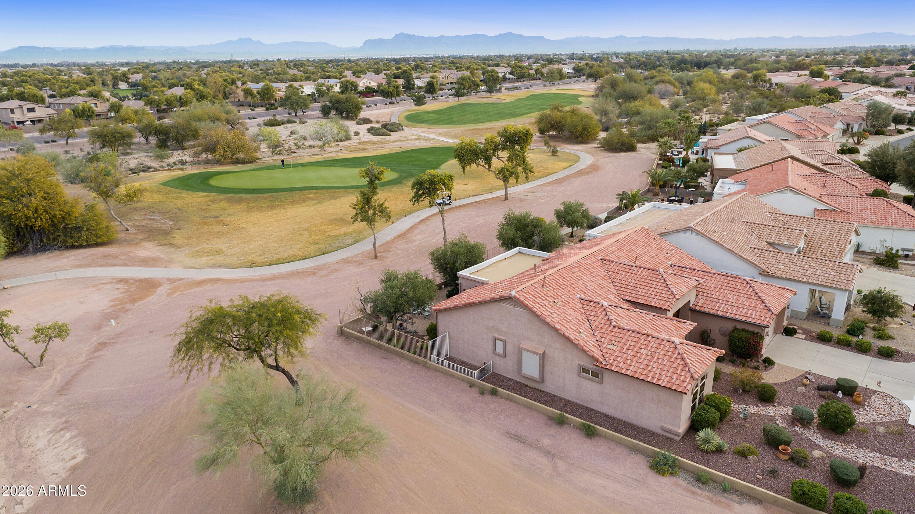 4100 East Strawberry Drive Gilbert, AZ 85298 - Photo 39 of 62 an aerial view of residential houses with outdoor space