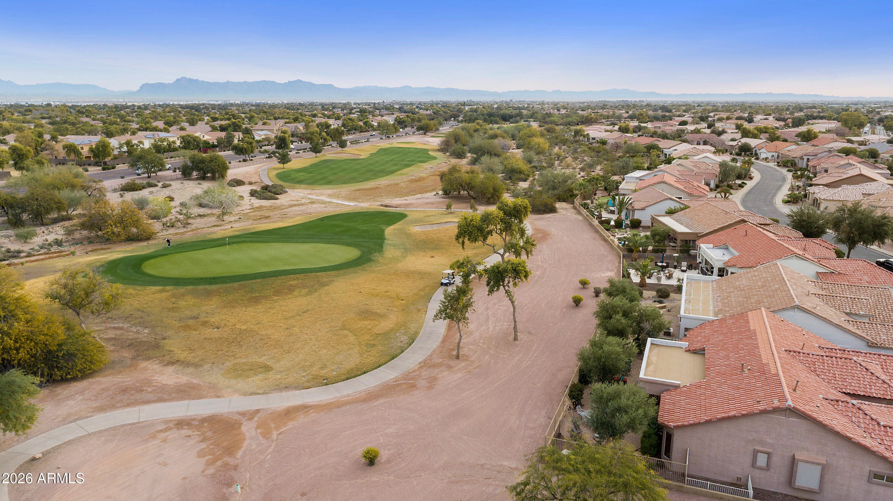 4100 East Strawberry Drive Gilbert, AZ 85298 - Photo 40 of 62 an aerial view of residential houses with outdoor space