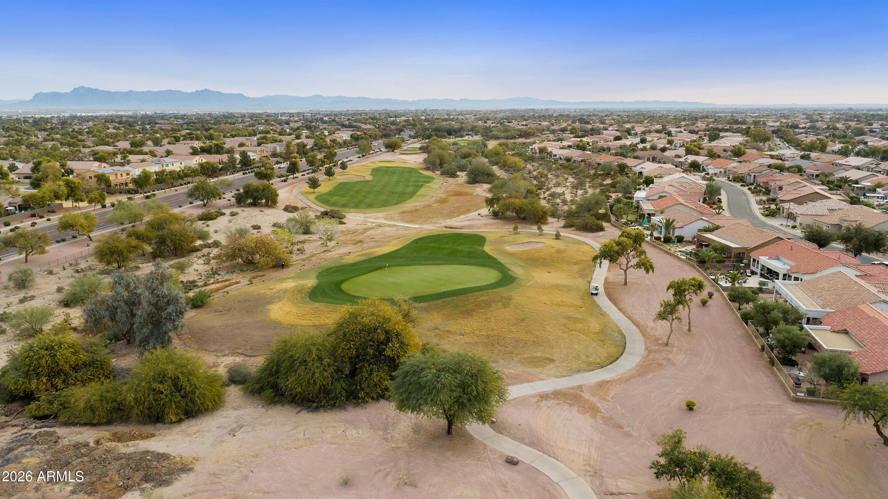 4100 East Strawberry Drive Gilbert, AZ 85298 - Photo 41 of 62 an aerial view of residential houses with outdoor space