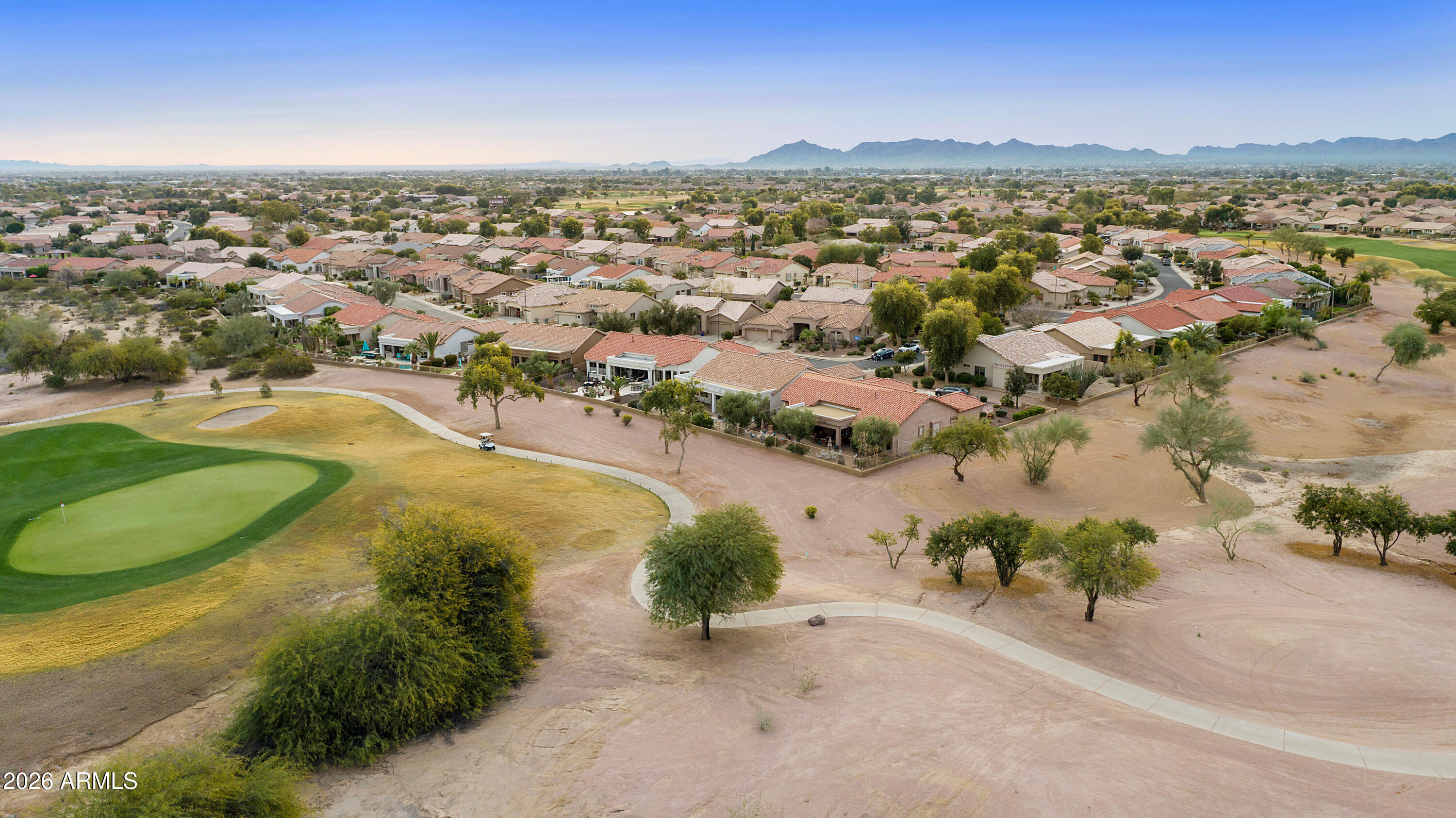 4100 East Strawberry Drive Gilbert, AZ 85298 - Photo 42 of 62 an aerial view of residential houses with outdoor space