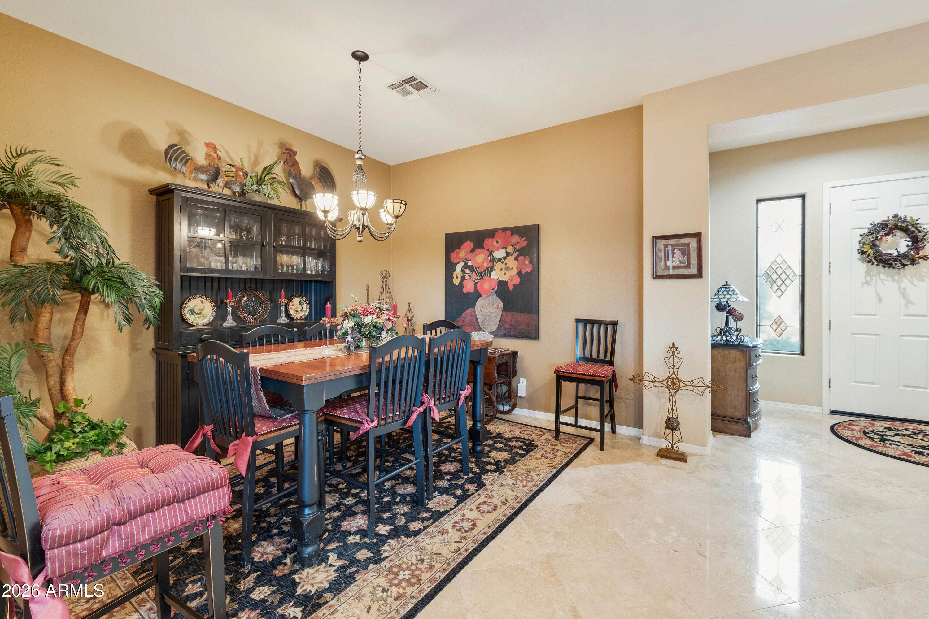 4100 East Strawberry Drive Gilbert, AZ 85298 - Photo 9 of 62 a view of a dining room with furniture