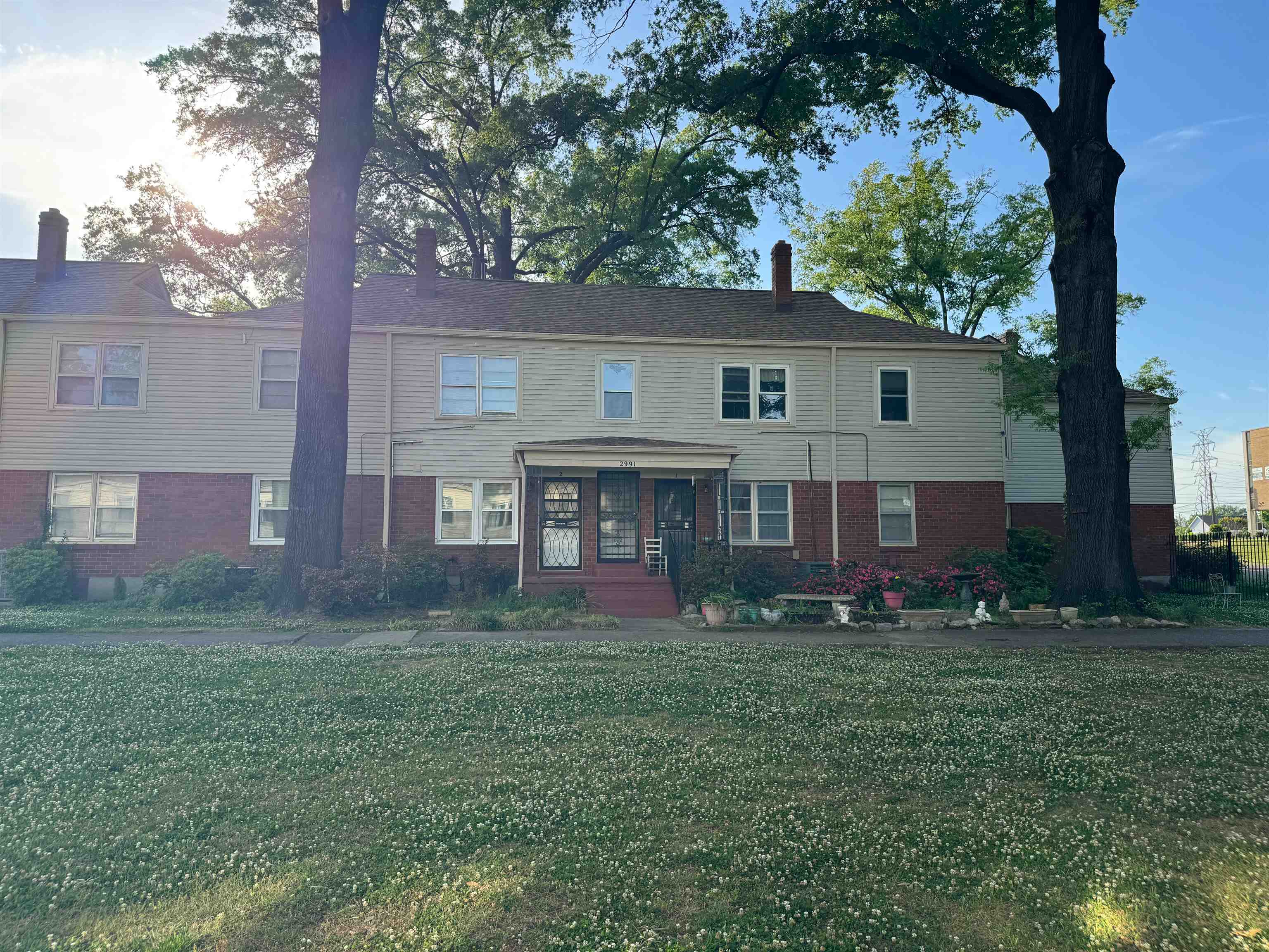 2991 Walnut Grove Road, Unit 2 Memphis, TN 38111 - Photo 3 of 8 a view of a house with a yard