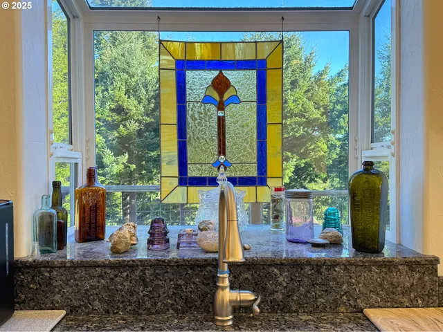 a kitchen with stainless steel appliances granite countertop wooden cabinets a sink and dishwasher