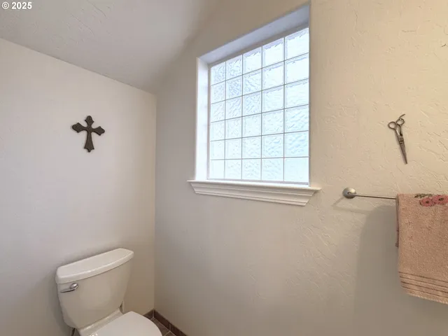 a view of balcony with wooden floor and fence