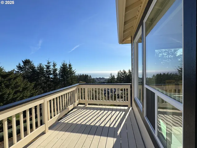 a living room with a couch and a rug