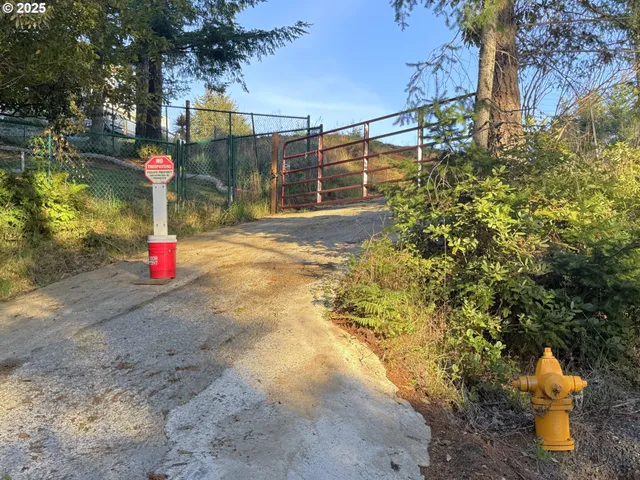a front view of a house with a garden and porch