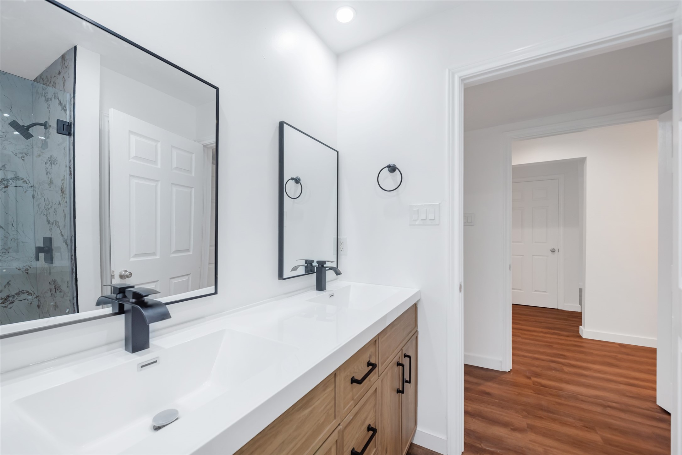 11703 North Perry Avenue Houston, TX 77071 - Photo 23 of 43 a bathroom with a sink and a mirror