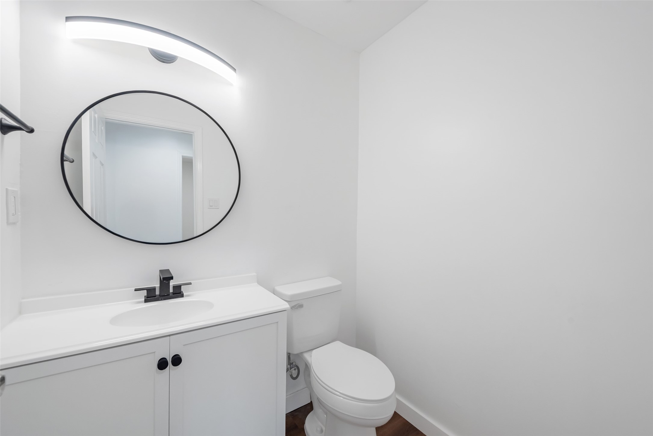 11703 North Perry Avenue Houston, TX 77071 - Photo 32 of 43 a bathroom with a sink a mirror and a toilet