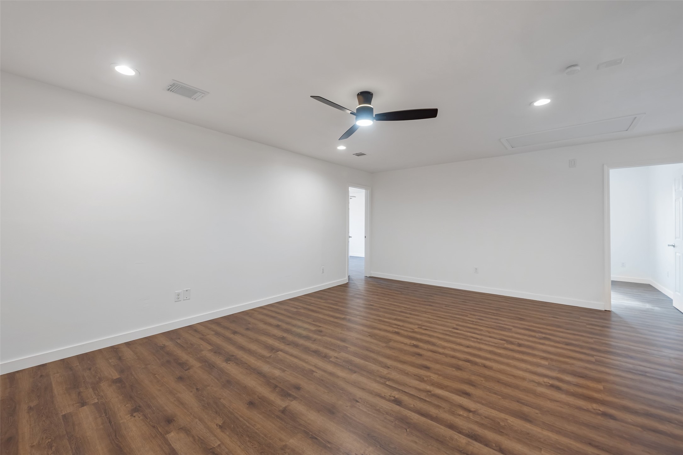 11703 North Perry Avenue Houston, TX 77071 - Photo 36 of 43 a view of an empty room with wooden floor