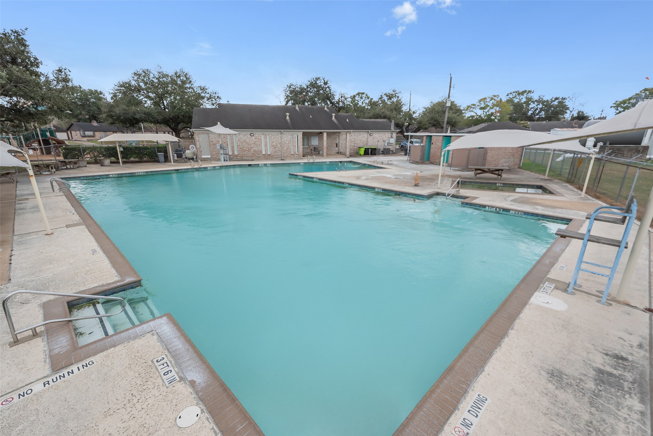 11703 North Perry Avenue Houston, TX 77071 - Photo 42 of 43 a view of a house with pool and chairs