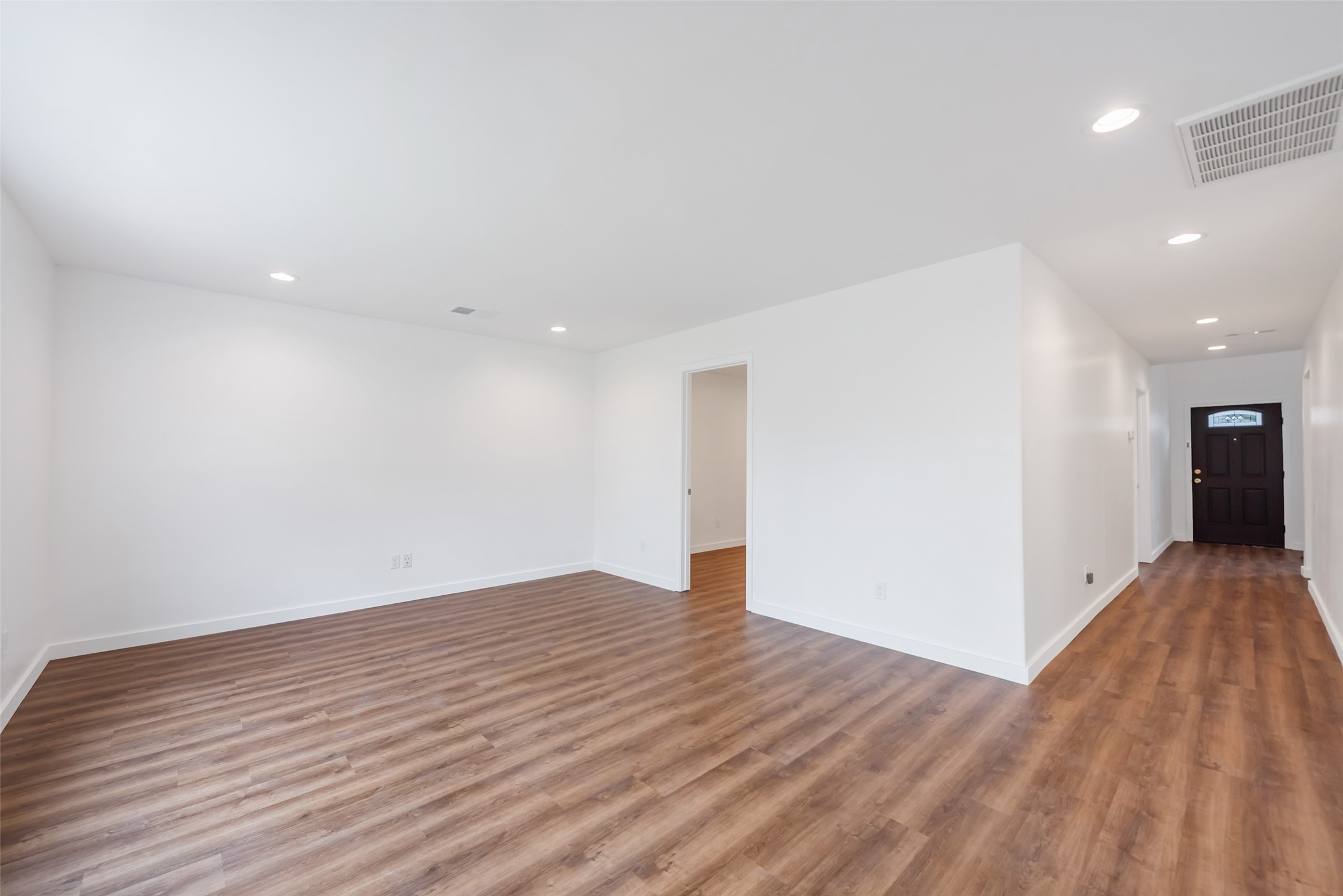 11703 North Perry Avenue Houston, TX 77071 - Photo 10 of 43 a view of an empty room with wooden floor