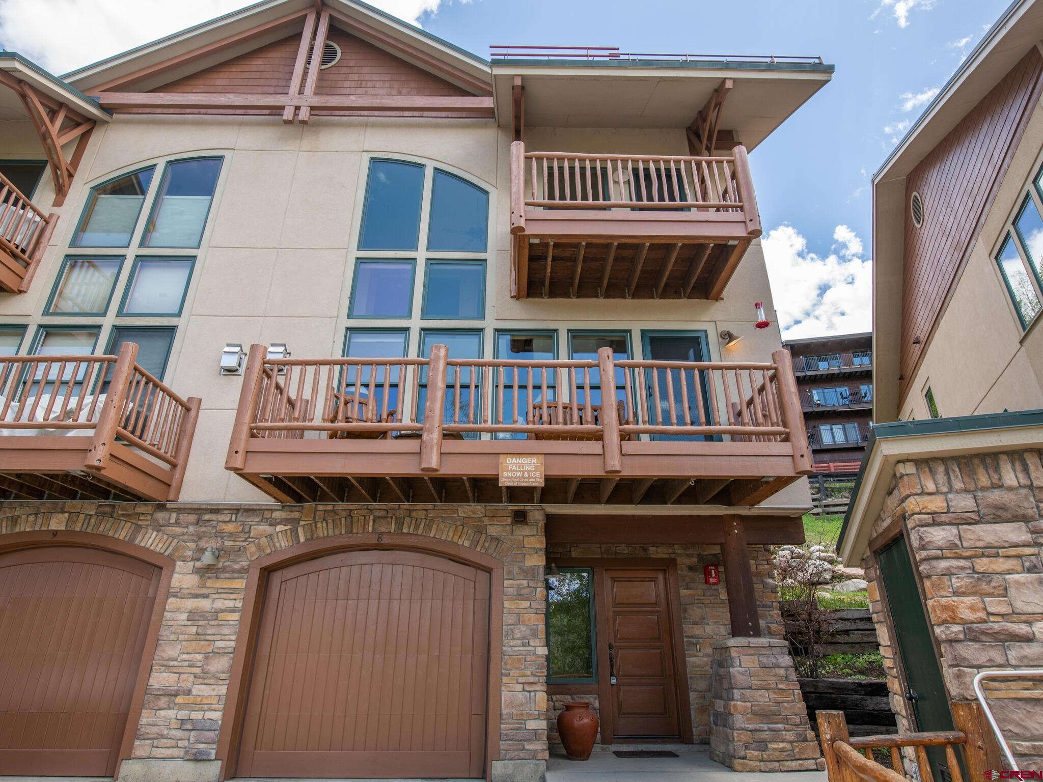24 Hunter Hill Road, Unit 8 Crested Butte, CO 81225 - Photo 2 of 34 a view of roof deck with patio