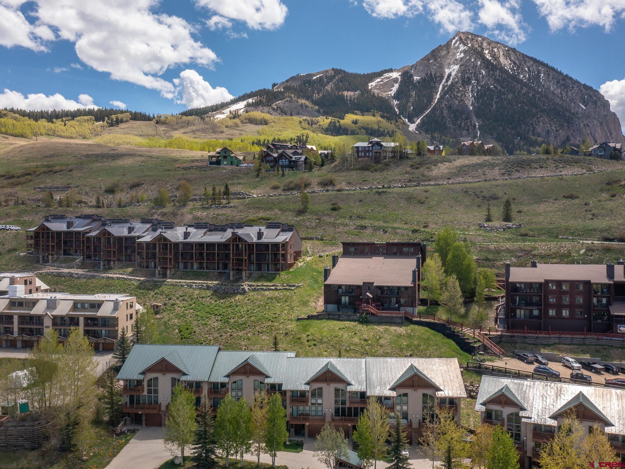 24 Hunter Hill Road, Unit 8 Crested Butte, CO 81225 - Photo 3 of 34 a aerial view of a house with a lake view