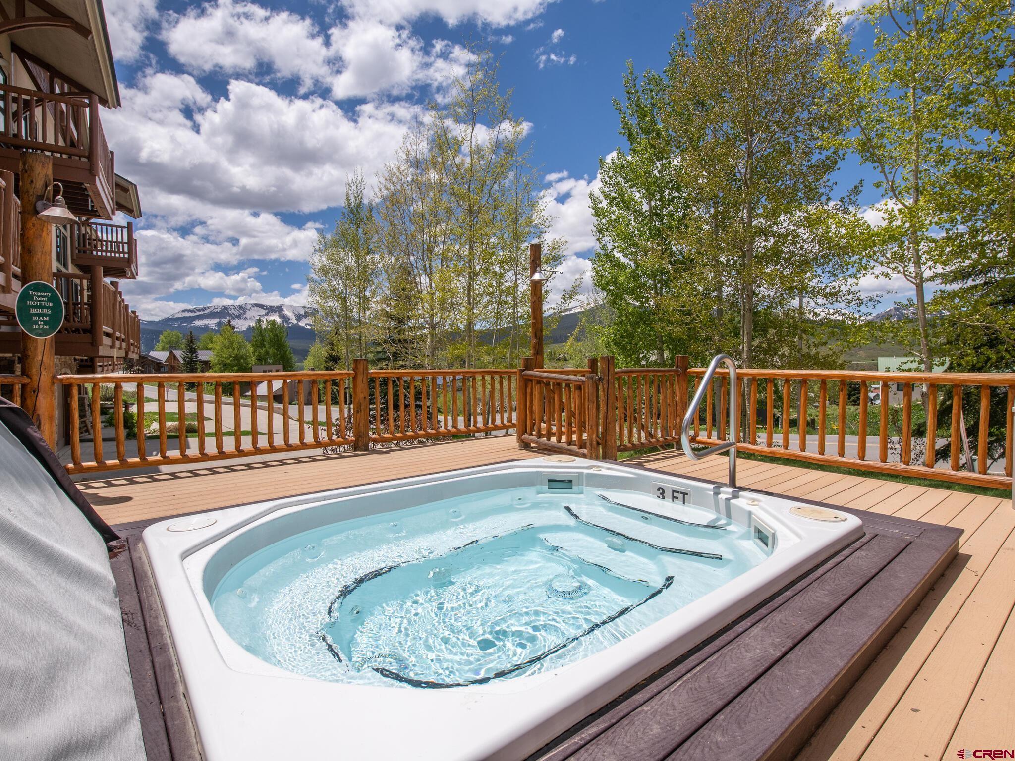 24 Hunter Hill Road, Unit 8 Crested Butte, CO 81225 - Photo 32 of 34 a view of a roof deck with wooden fence